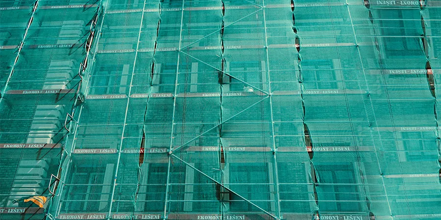 Construction building with dust covers